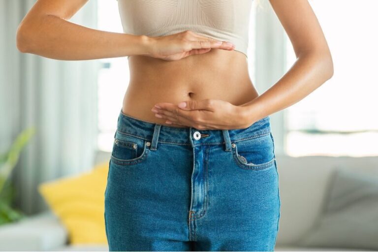 A healthy woman with healthy gut health